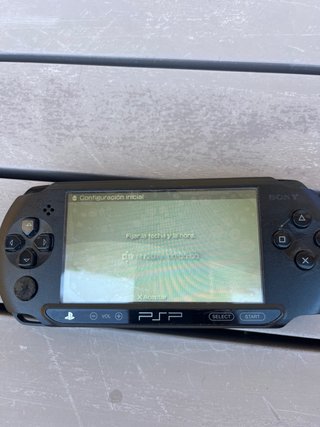PSP Nera + Caricatore e 2 Giochi