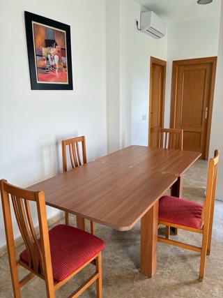 Set de mesa extensible y 4 sillas para salón