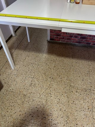 Mesa de comedor blanca de madera expansible