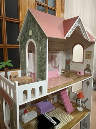 Casa de muñecas de madera