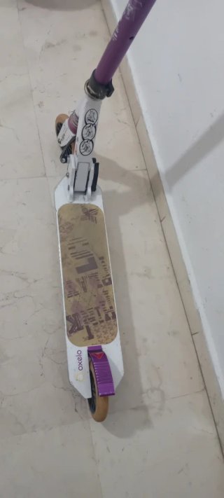 Patinete Oxelo blanco y morado