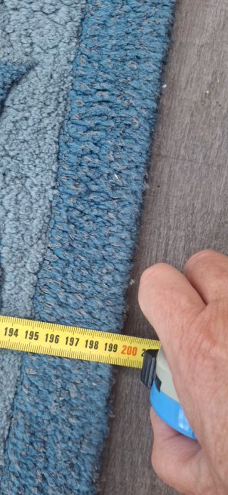 Alfombra grande de lana azul y marrón