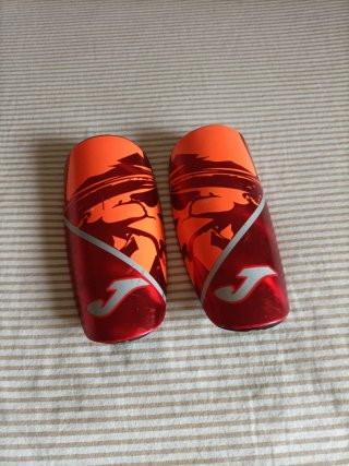 Espinilleras Joma Naranja y Rojo