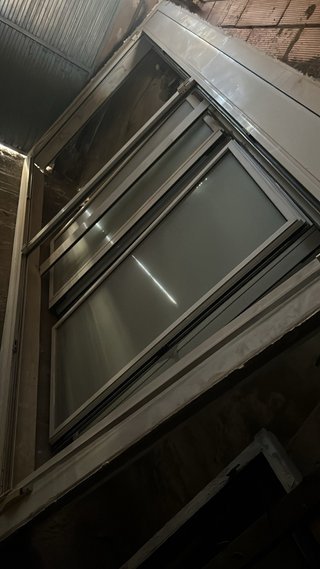 Ventana aluminio oscilobatiente