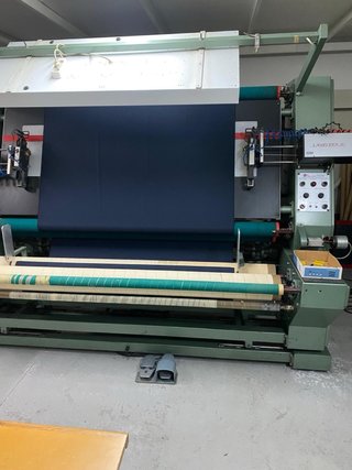Máquina repasadora de tejido