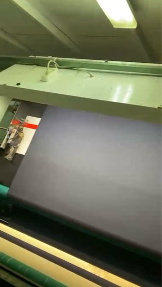 Máquina repasadora de tejido