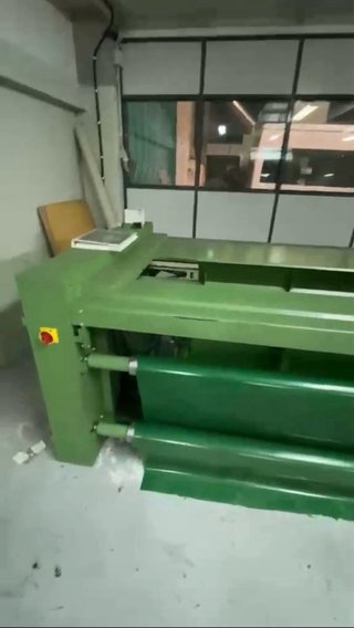 Máquina embolsadora de tejido