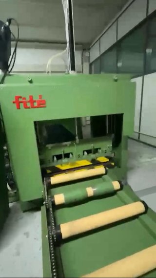 Máquina embolsadora de tejido