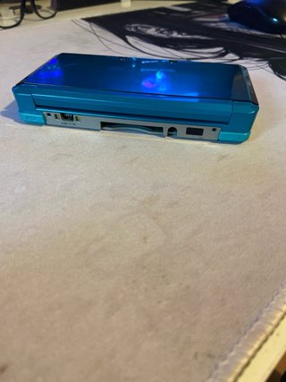 Nintendo 3DS Aqua y juego thunderscat nintendo DS