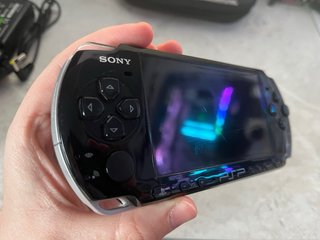 Sony PSP 3000 con cargador y funda