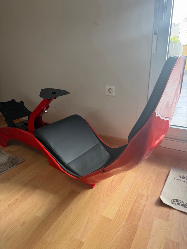 Cockpit simulador conducción Playseat rojo