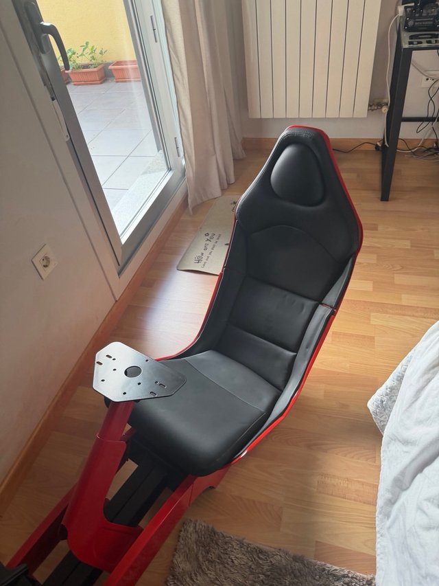 Cockpit simulador conducción Playseat rojo