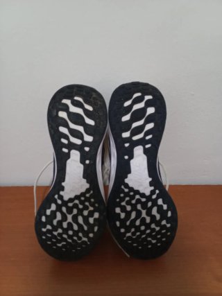 Zapatillas deportivas Nike azules y blancas