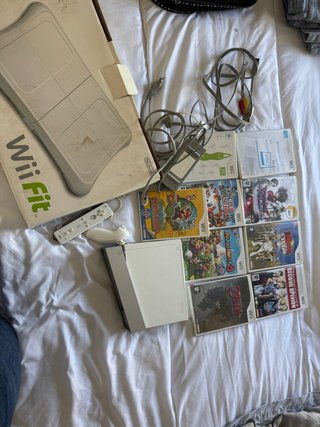 Nintendo Wii + Wii Fit + Juegos
