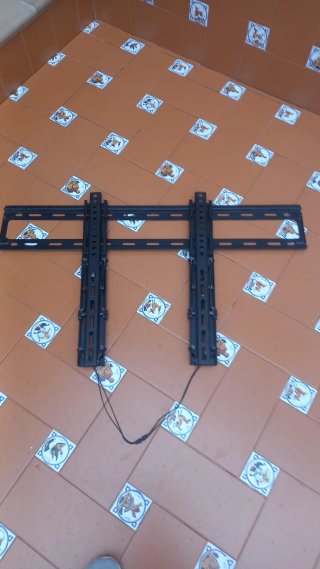Soporte de pared para televisión de 55 pulgadas.
