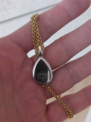 Colgante Reloj Seiko Oro y Plata