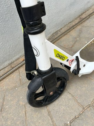 Patinete Oxelo blanco y amarillo