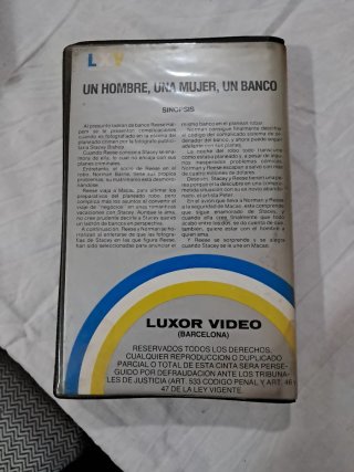 VHS Un Hombre, Una Mujer, Un Banco