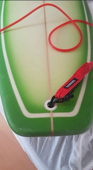 Tabla de surf verde y blanca