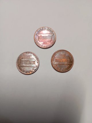 3 Monedas One Cent USA 1984D 1986D 1977D,.