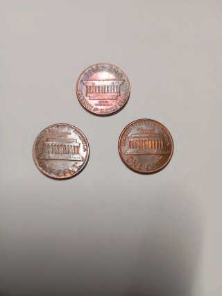 3 Monedas One Cent USA 1984D 1986D 1977D,.