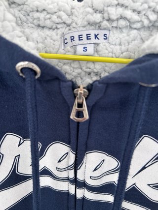 Sudadera Creeks con capucha y cremallera