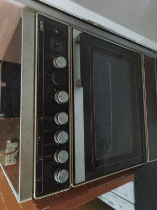 Cocina de gas con horno eléctrico