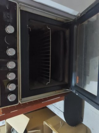 Cocina de gas con horno eléctrico