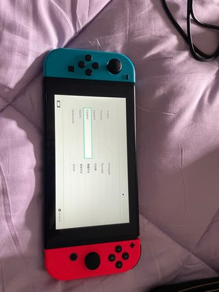Nintendo Switch + Funda Animal Crossing