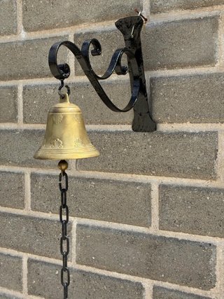 Campana antica bronzo con supporto ferro