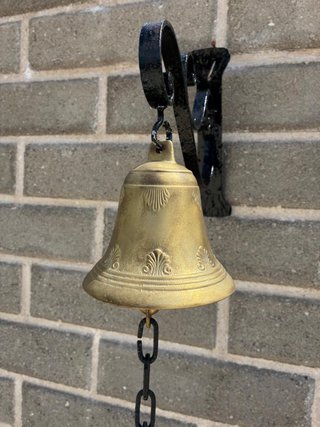 Campana antica bronzo con supporto ferro