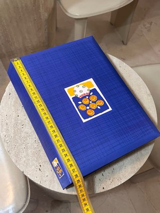 Álbum de fotos azul con diseño floral