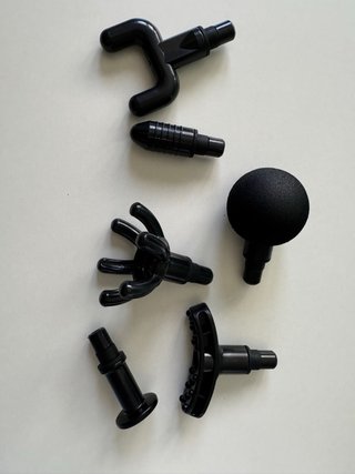 Pistola de masaje