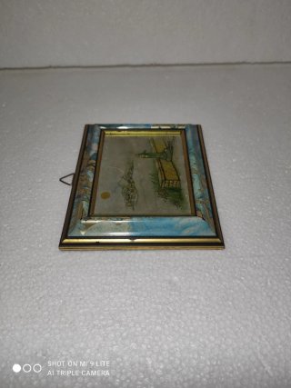 Quadro vintage metallo e legno