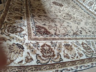 Alfombra oriental beige y marrón