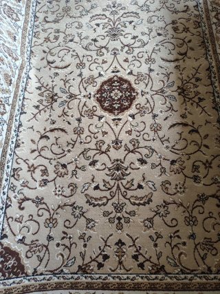 Alfombra oriental beige y marrón