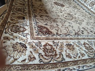 Alfombra oriental beige y marrón
