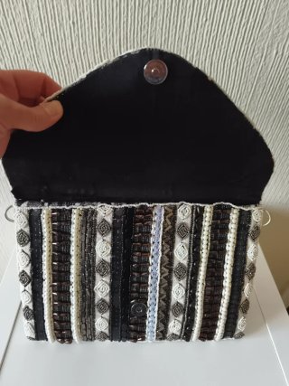 Bolso blanco y negro Bluebags con etiqueta