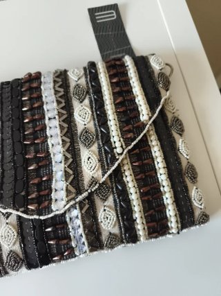 Bolso blanco y negro Bluebags con etiqueta