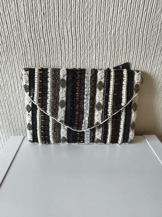 Bolso blanco y negro Bluebags con etiqueta