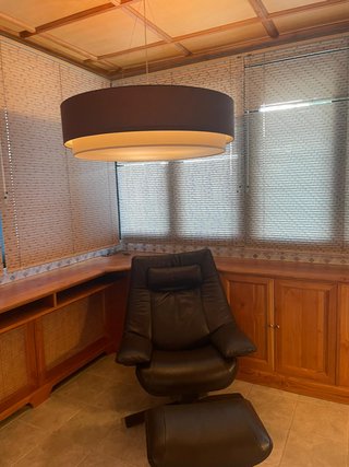 Sillón Natuzzi Piel Negra + Reposapiés