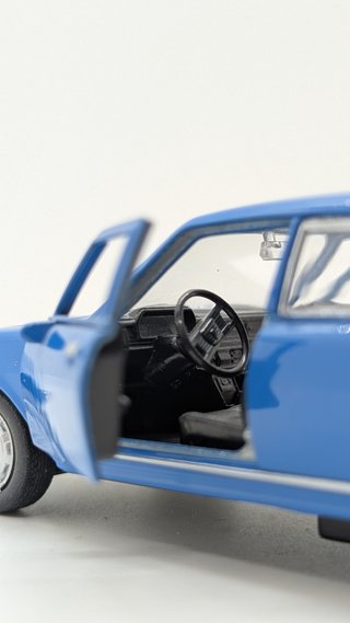Welly Peugeot 504 (light blue) 42394 1/34