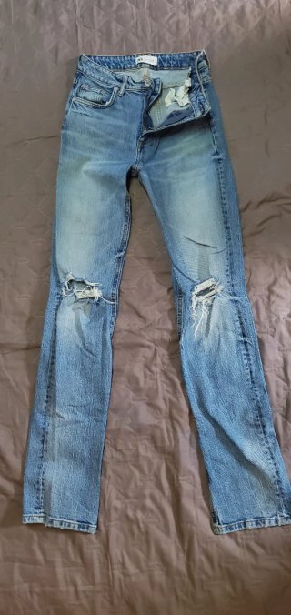 Pantalones beige tiro alto