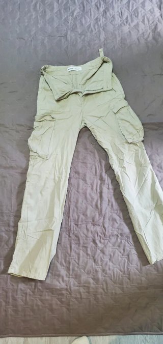 Pantalones beige tiro alto