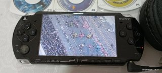 Consola PSP en su caja, Manual, cargador+ 7 Juegos