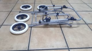 Cochecito de juguete para muñecas