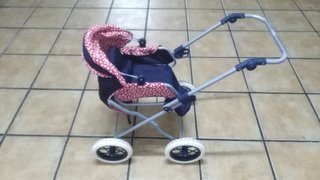 Cochecito de juguete para muñecas