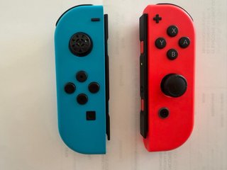 Nintendo Switch OLED 7 64GB azul y roja