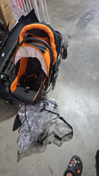 Carrito de bebé Graco naranja y negro
