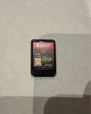 Nintendo Switch OLED + Zelda Tears of Kingdom